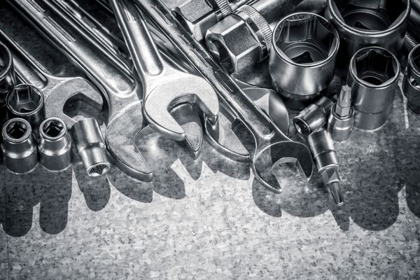 several wrenches in a pile
