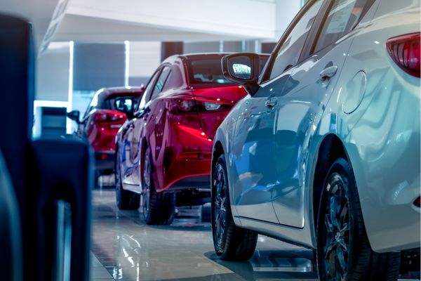 new vehicle models in a dealership showroom