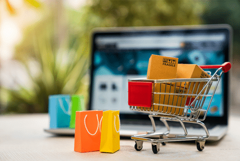 shopping online with a fake shopping cart and boxes