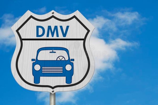 dmv sign in a blue sky